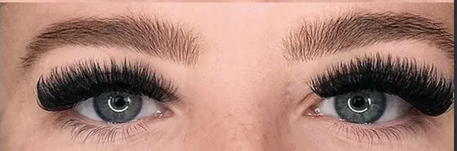 Mega volume eyelash extensions — dense fans of 10 to 15 of the finest 0.03mm lashes for maximum drama