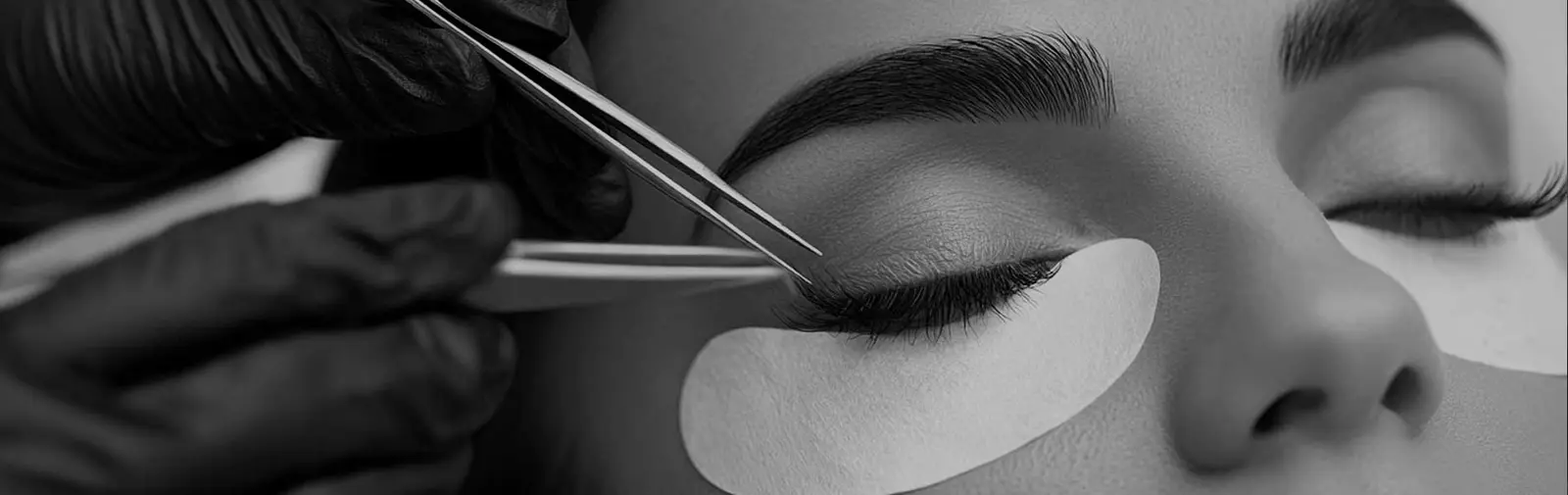 Precision eyelash extension application with tweezers